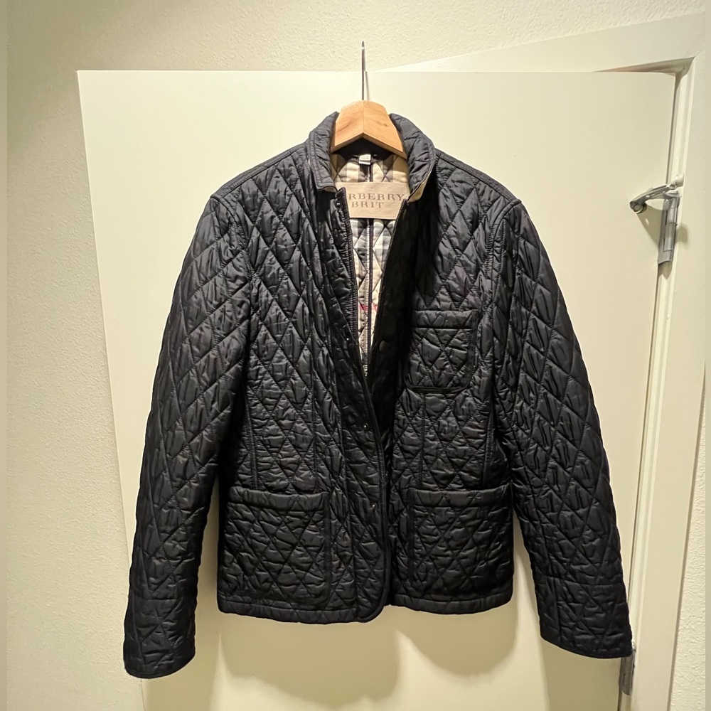 Quilted Burberry jacket, size, medium, worn only one time. Is like brand new